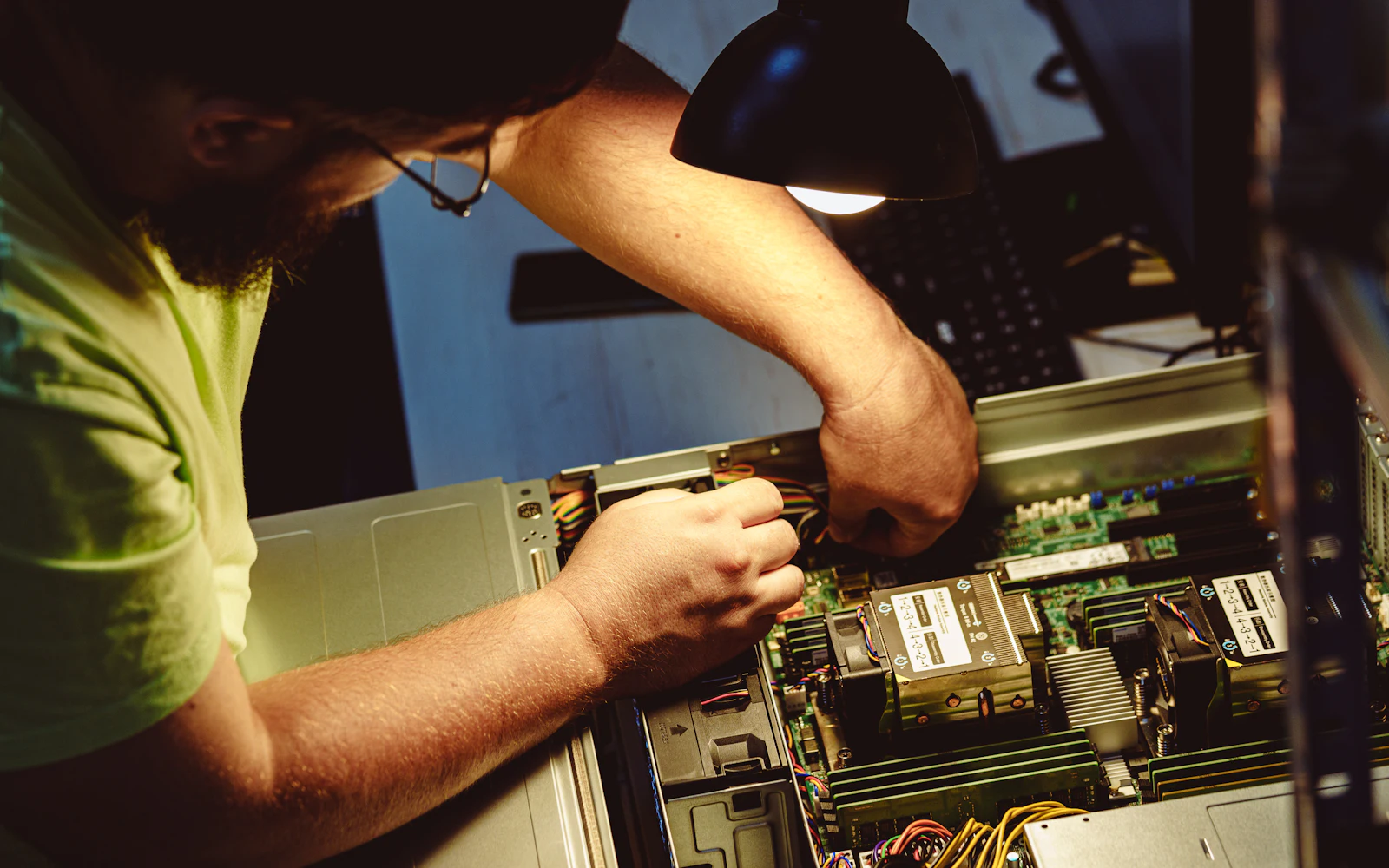 Technician servicing server hardware